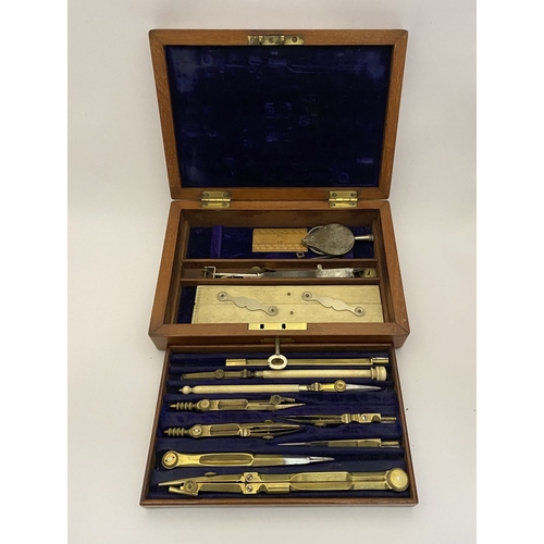 109 - A VINTAGE HARDWOOD CASED SET OF DRAUGHTSMAN TOOLS, the hardwood case with brass cartouche to top and... 