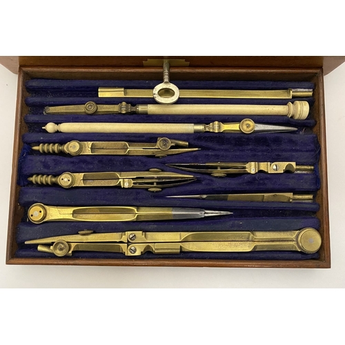 109 - A VINTAGE HARDWOOD CASED SET OF DRAUGHTSMAN TOOLS, the hardwood case with brass cartouche to top and... 