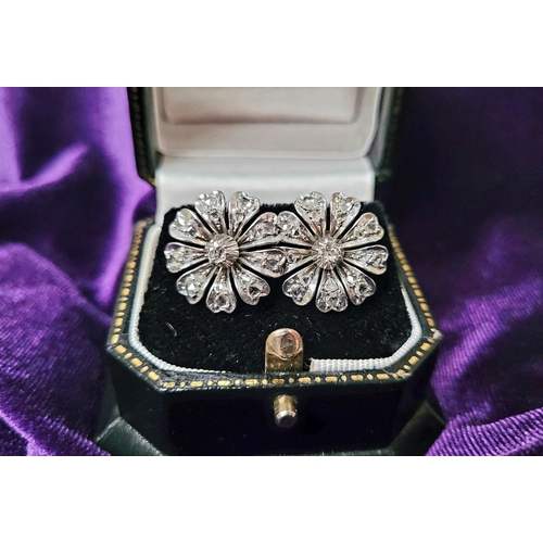 11 - A FANTASTIC PAIR OF ANTIQUE DIAMOND ENCRUSTED FLOWER SHAPED EARRINGS, each of the finely crafted ear... 