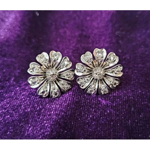 11 - A FANTASTIC PAIR OF ANTIQUE DIAMOND ENCRUSTED FLOWER SHAPED EARRINGS, each of the finely crafted ear... 