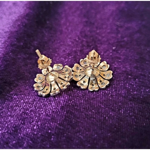 11 - A FANTASTIC PAIR OF ANTIQUE DIAMOND ENCRUSTED FLOWER SHAPED EARRINGS, each of the finely crafted ear... 