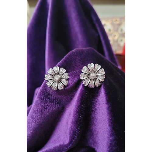 11 - A FANTASTIC PAIR OF ANTIQUE DIAMOND ENCRUSTED FLOWER SHAPED EARRINGS, each of the finely crafted ear... 