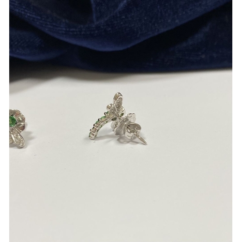 111 - A PAIR OF 18CT WHITE GOLD DRAGONFLY EARRINGS, with six green garnets to centre graduating in size, t... 