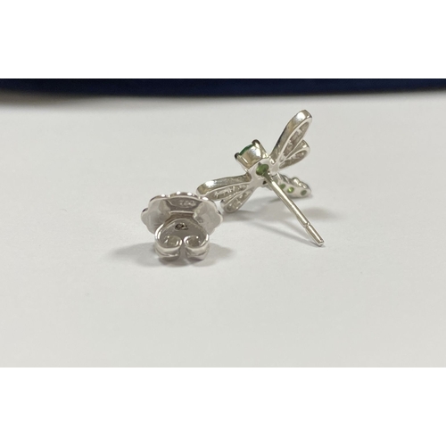 111 - A PAIR OF 18CT WHITE GOLD DRAGONFLY EARRINGS, with six green garnets to centre graduating in size, t... 