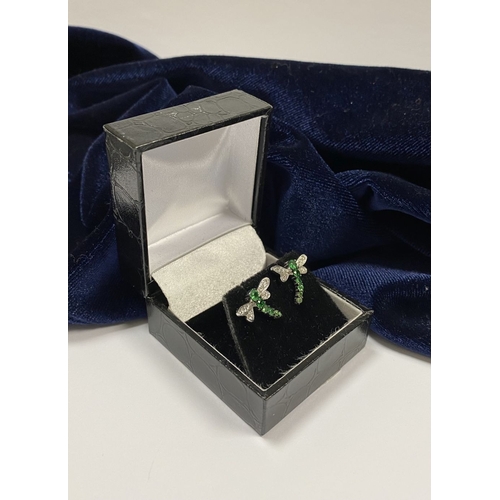 111 - A PAIR OF 18CT WHITE GOLD DRAGONFLY EARRINGS, with six green garnets to centre graduating in size, t... 