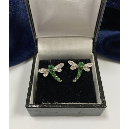 111 - A PAIR OF 18CT WHITE GOLD DRAGONFLY EARRINGS, with six green garnets to centre graduating in size, t... 