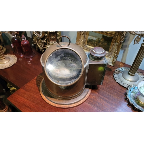 125 - AN ANTIQUE/VINTAGE SESTREL BOAT/SHIPS BINNACLE COMPASS, with side oil lamp compartment. Attached to ... 