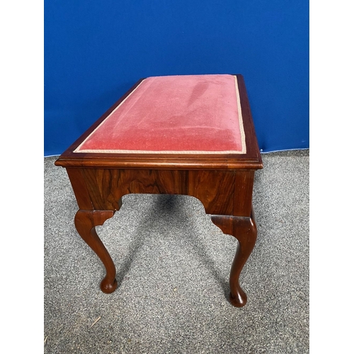 127 - A WALNUT QUEEN ANNE STYLE STOOL, upholstery to centre of rectangular top, nice carving to frieze, ra... 