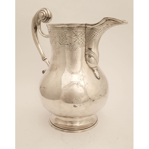 13 - A VERY FINE IRISH GEORGE II SOLID SILVER BEER JUG BY JOHN HAMILTON, circa 1730s, of Dublin. The jug ... 