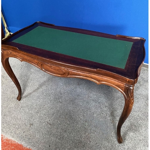 130 - AN EXCELLENT ROSEWOOD COMBINATION GAMES TABLE, serpentine shaped, the top can be overturned to revea... 