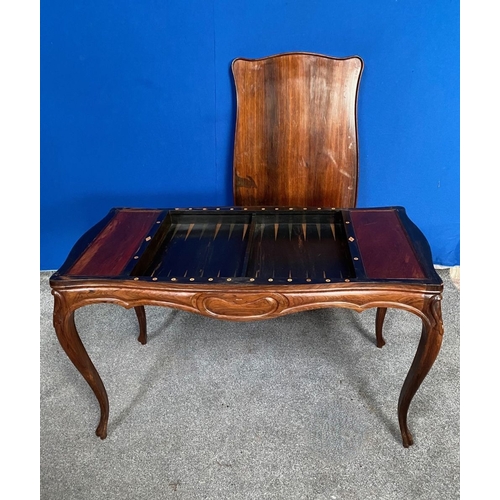 130 - AN EXCELLENT ROSEWOOD COMBINATION GAMES TABLE, serpentine shaped, the top can be overturned to revea... 