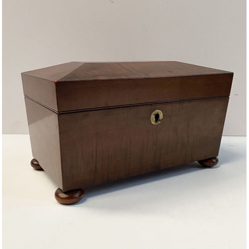 133 - A GOOD MAHOGANY SARCOPHAGUS SHAPED TEA CADDY, with circular brass escutcheon to front, opening to tw... 