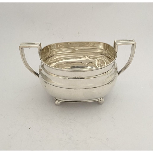 135 - A GEORGE VI SILVER SUGAR BOWL AND MILK JUG, both by EJE Sheffield, c.1941. Of matching design, raise... 