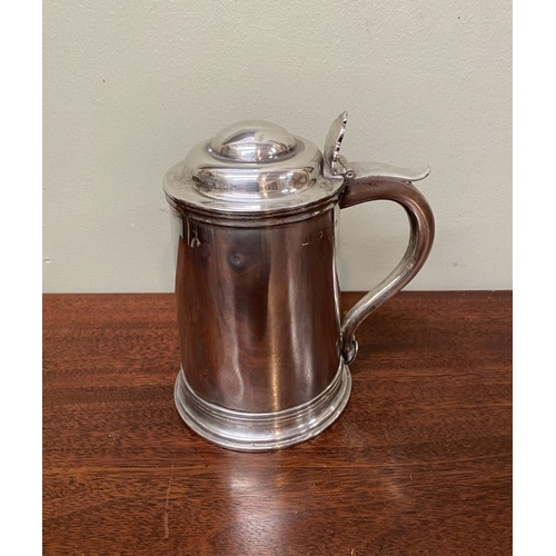 139 - A GEORGE V SILVER TANKARD, by George Unite, Caroline Street, Birmingham c.1865. the hinged domed cov... 