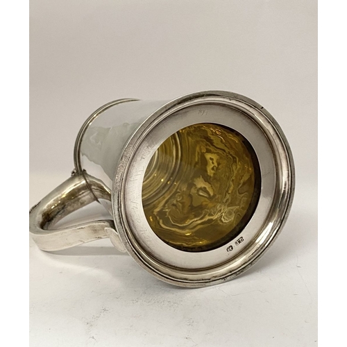 139 - A GEORGE V SILVER TANKARD, by George Unite, Caroline Street, Birmingham c.1865. the hinged domed cov... 