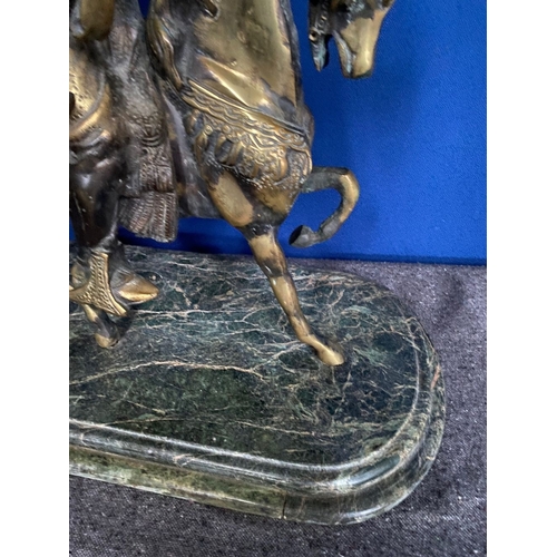 143 - A LARGE BRONZE SCULPTURE ON MARBLE BASE, sculpture of nobleman on horse, finely detailed, on stepped... 