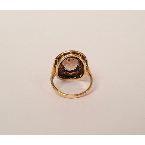 145 - A VERY FINE 9CT YELLOW GOLD SMOKY QUARTZ DRESS RING, the large oval shaped smoky quartz stone is set... 