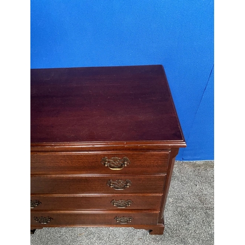 146 - A NEAT SIZED FOUR DRAWER CHEST, with brass handles, raised on bracket feet. Dimensions: 76cm x 47cm ... 