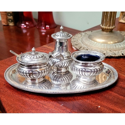 148 - A VERY GOOD QUALITY ANTIQUE STERLING SILVER CONDIMENT SET with silver tray, comprising of a blue lin... 