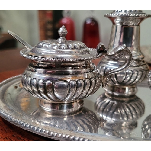 148 - A VERY GOOD QUALITY ANTIQUE STERLING SILVER CONDIMENT SET with silver tray, comprising of a blue lin... 