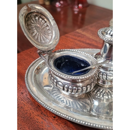 148 - A VERY GOOD QUALITY ANTIQUE STERLING SILVER CONDIMENT SET with silver tray, comprising of a blue lin... 