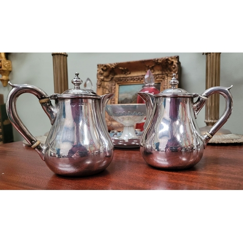 152 - A VERY FINE & GOOD QUALITY PAIR OF SILVER BREAKFAST TEAPOTS BY GOLDSMITHS & SILVERSMITHS CO. LTD, LO... 