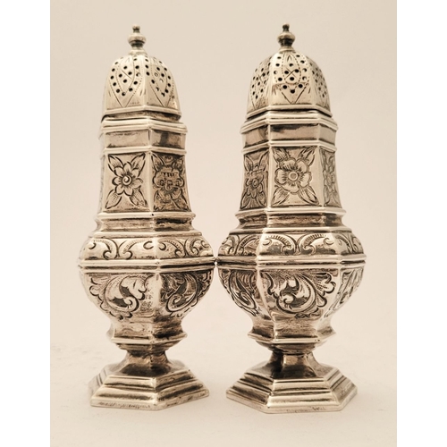 153 - A FINE PAIR OF SILVER SUGAR SIFTERS, each decorated al over with floral and foliage details, Birming... 