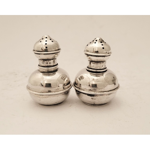 155 - A PAIR OF NEATLY SIZED SILVER SALT & PEPPER SHAKERS, each with a rounded body having a raised reed d... 