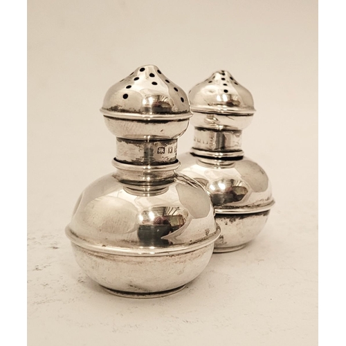 155 - A PAIR OF NEATLY SIZED SILVER SALT & PEPPER SHAKERS, each with a rounded body having a raised reed d... 