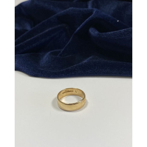 163 - A 9CT YELLOW GOLD BAND, hallmarked to interior with Makers mark H.S, London, 375. Ring size: T/U. We... 