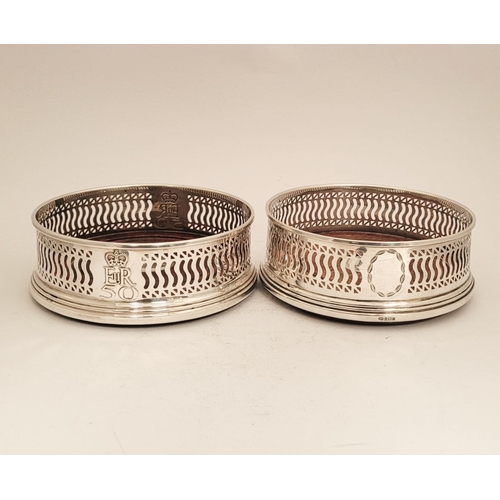 168 - TWO VERY GOOD QUALITY SILVER WINE COASTERS, both with a matching pierced raised gallery surround and... 