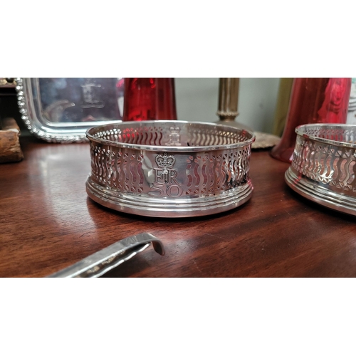 168 - TWO VERY GOOD QUALITY SILVER WINE COASTERS, both with a matching pierced raised gallery surround and... 