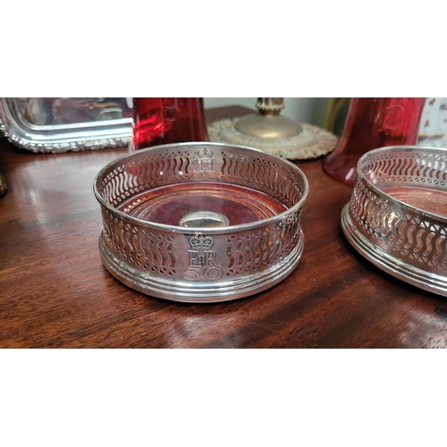 168 - TWO VERY GOOD QUALITY SILVER WINE COASTERS, both with a matching pierced raised gallery surround and... 