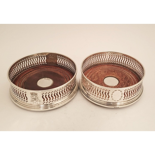 168 - TWO VERY GOOD QUALITY SILVER WINE COASTERS, both with a matching pierced raised gallery surround and... 