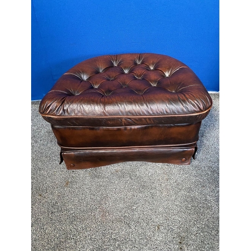 174 - A BROWN LEATHER FOOTSTOOL/OTTOMAN, nice deep button upholstery to top, leather surrounding covering ... 