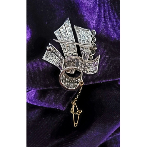 176 - A BEAUTIFUL ART DECO ERA DIAMOND ENCRUSTED RIBBON BROOCH, a stunning piece of jewellery craftsmanshi... 