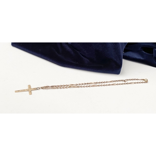 178 - A 9CT YELLOW GOLD ENGRAVED CROSS PENDANT NECKLACE, the pendant is highly decorated with engraved des... 