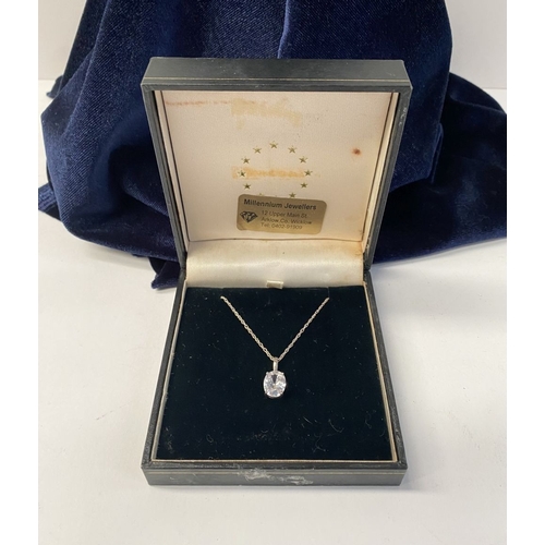 181 - A BEAUTIFUL STERLING SILVER PENDANT NECKLACE, with vibrant oval cut stone, likely cubic zirconia, in... 