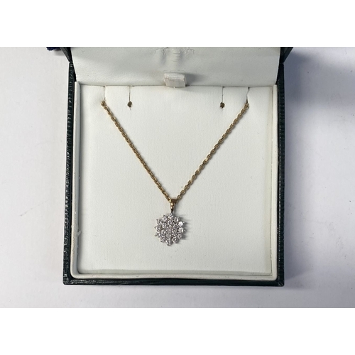 195 - A PRETTY 9CT YELLOW GOLD CLUSTER PENDANT NECKLACE, the pendant with central round cut gemstone surro... 