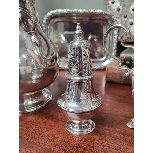 197 - A VERY FINE IRISH GEORGE II 18TH CENTURY SILVER SUGAR CASTER, with a pierced lift away sifter topped... 