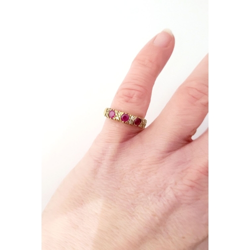 198 - AN ANTIQUE 9CT YELLOW GOLD 11 STONE RUBY & DIAMOND RING, with three round cut rubies and two diamond... 