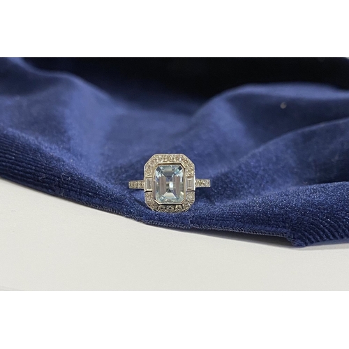 21 - AN 18CT WHITE GOLD AQUAMARINE & DIAMOND RING, with central emerald cut aquamarine, weight: 1.12cts, ... 