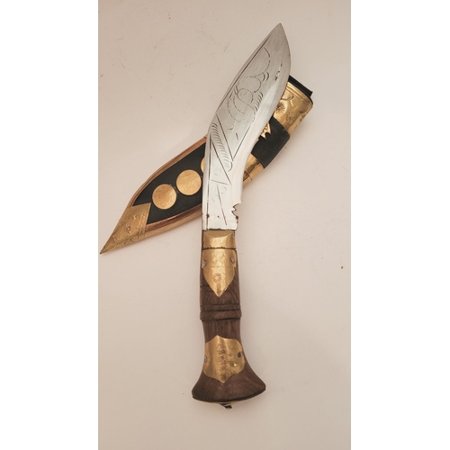 214 - A CONTEMPORY NEPALESE KUKRI GURKHA STYLE KNIFE, in sheath. The leather sheath with brass decorations... 