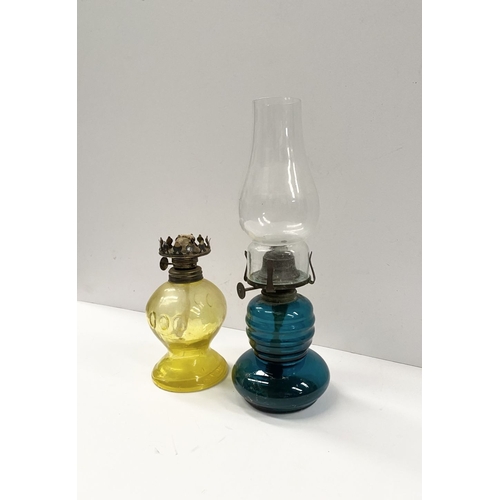 218 - TWO VINTAGE YELLOW & BLUE GLASS OIL LAMPS, (i) blue glass lamp reading ‘British Made’ to burner, com... 