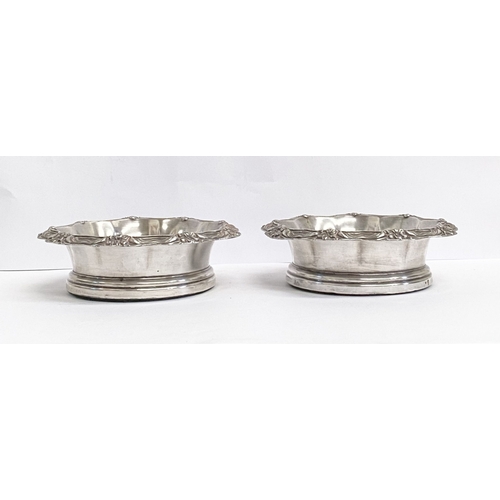 219 - A FINE PAIR OF ANTIQUE CONTINENTAL SILVER WINE COASTERS, Makers marks slightly rubbed, possibly Germ... 