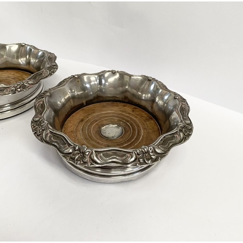 219 - A FINE PAIR OF ANTIQUE CONTINENTAL SILVER WINE COASTERS, Makers marks slightly rubbed, possibly Germ... 