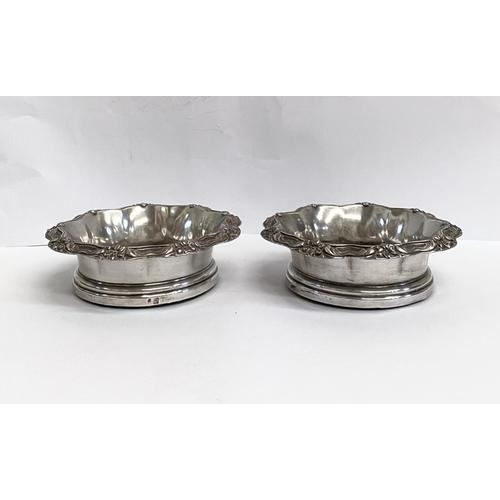 219 - A FINE PAIR OF ANTIQUE CONTINENTAL SILVER WINE COASTERS, Makers marks slightly rubbed, possibly Germ... 