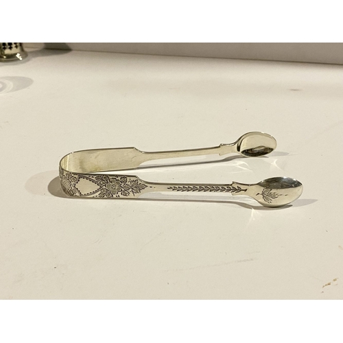 223 - A SILVER CONDIMENT LOT WITH SUGAR TONGS, to include (i) a nicely decorated silver sugar tongs, by Ro... 