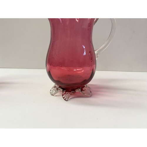 224 - A COLLECTION OF VINTAGE RUBY GLASS, to include (i) an painted and etched glass decanter, (ii) a ruby... 