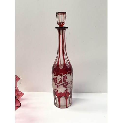 224 - A COLLECTION OF VINTAGE RUBY GLASS, to include (i) an painted and etched glass decanter, (ii) a ruby... 